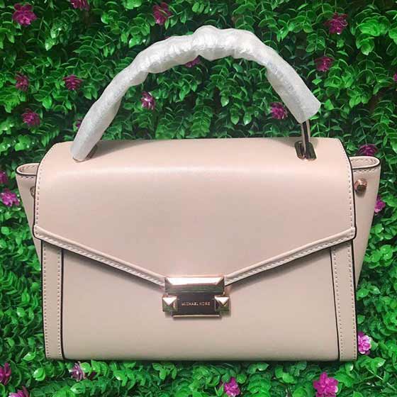 MK Whitney 新款牛皮斜挎翻蓋拼色蝙蝠包笑臉 耳朵包