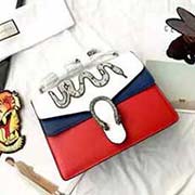 gucci酒神系列標志性的雙虎頭