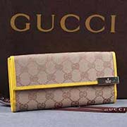 代買帆布配皮長款搭扣女款三折帶