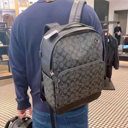 蔻馳的雙肩包，經典PVC配頭層牛男士休閑時尚雙肩包