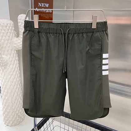 TB經典系列四條杠壓膠運動短褲