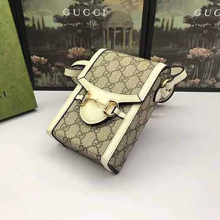 1955馬銜扣老花式手機包，百搭真