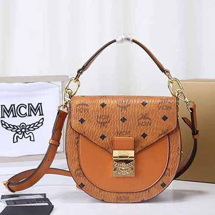 MCM喬欣同款郵差女包 新款復(fù)古馬鞍包 斜挎手提半圓包